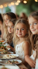 Fototapeta premium Smiling Young Girl at Elegant Wedding Reception Dinner Table - vertical format