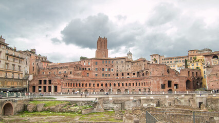 Obraz premium A panoramic view on Trajan's Market timelapse hyperlapse on the Via dei Fori Imperiali, in Rome, Italy