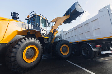New bulldozer and dump truck on the exhibition site