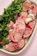 Fresh raw rabbit meat on dish