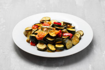 Grilled vegetables on white plate