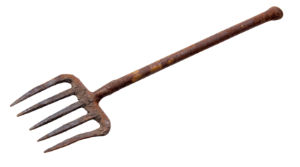 Old garden fork lying on a white surface waiting for use