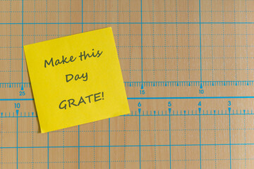 Colored paper note with adhesive tape with motivational phrases, post it glued on a very nice...