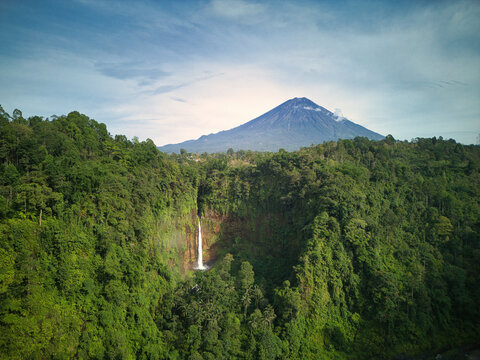 Majestic view of Mount Semeru and Kaspa Biru Waterfall