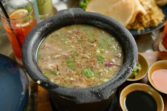 Traditional Sop Khas Tanah Abang soup served in a black bowl