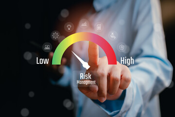 Risk Management Scale with Finger Pointing, Indicators of Low, Medium, and High Risk Levels, Business concept