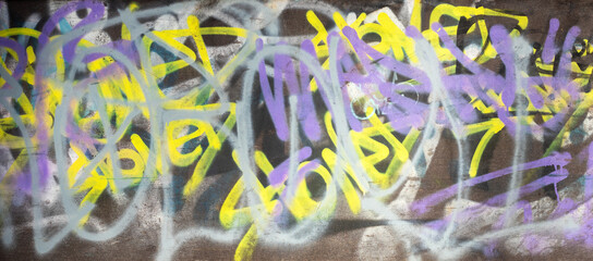 Vivid colorful graffiti artwork with abstract shapes and painted texture