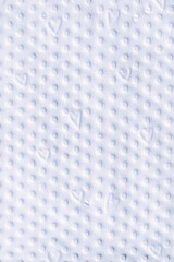 white paper background with embossed dots and hearts, copy space, textured pattern