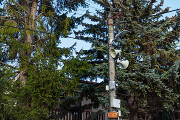 Fototapeta premium outdoor radio amplion, megaphone, used to announce public information in the village. Speaker on high tower.