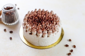 Traditional italian desert tiramisu in a jar.