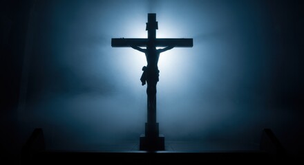 Naklejka premium Good Friday sacrifice. Crucifixion silhouette with dramatic blue mist light and sacred atmosphere in solemn remembrance