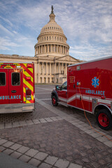 Capitol building and emergency ambulance vehicles