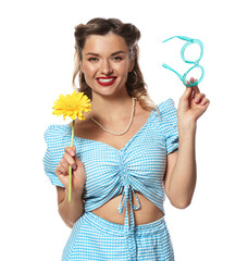 Happy pin-up woman with flower and glasses on white background