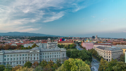 Obraz premium Panorama of the city center day to night timelapse with intersection in front of national theater and museum in Zagreb, Croatia.