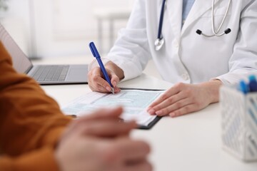 Man having appointment with doctor in hospital, closeup