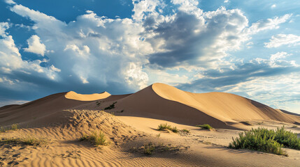 Majestic sand dunes rise against a cloudy sky in Kazakhstan&acirc;&euro;&trade;s Altyn-Emel National Park, home to the famous singing dunes