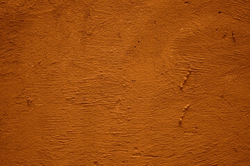 abstract brown red  yellow orange texture cement plaster stucco concrete wall background. painted fence pattern textured backdrop.  color paint colour.