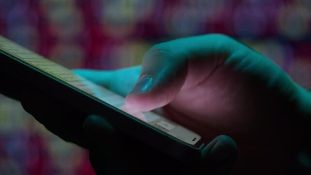 Phone smartphone at night office, Man work with chatbot AI online, connecting with AI and using a chat bot. IT engineer software developer programmer interact with chat bot, making writing code