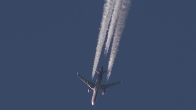 Slow Motion Jet Plane Flying in the Sky