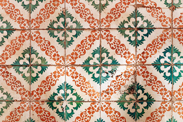 Close-up of traditional azulejo tiles on a historic facade in downtown Lisbon