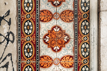 Close-up of traditional azulejo tiles on a historic facade in downtown Lisbon