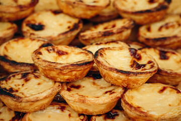 Traditional Portuguese dessert pasteis de nata, served fresh in Lisbon