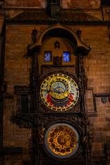 Astronomical Clock of Prague shining during night in Czech Republic