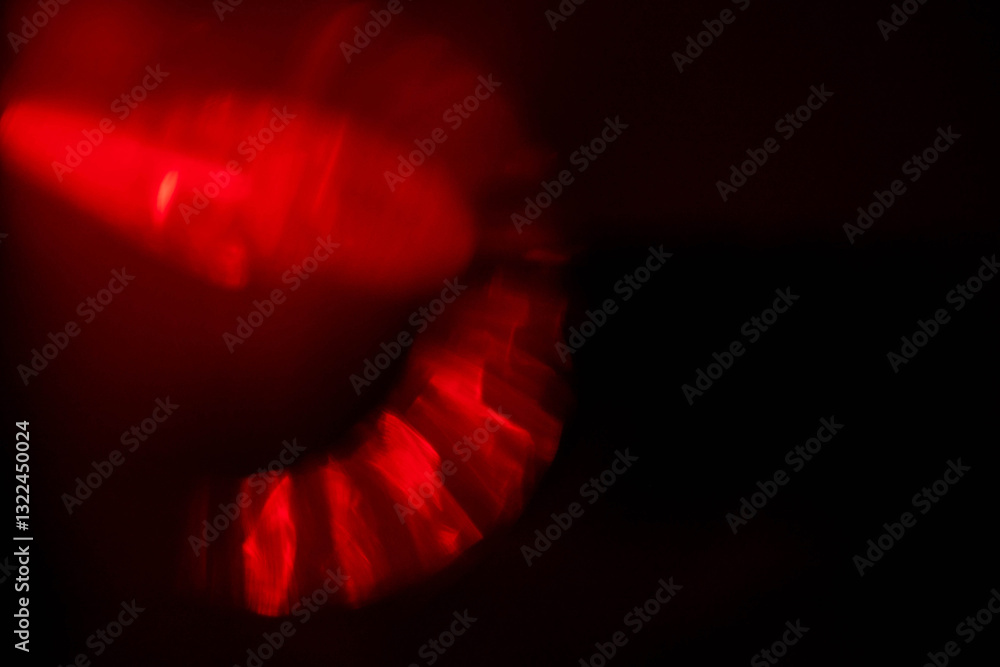Wall mural red light leaks on dark background. abstract background for design with random shapes. colorful ligh