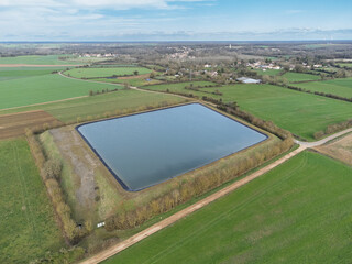 Photo aérienne d'une bassine agricole. Aerial photo of an agricultural basin.