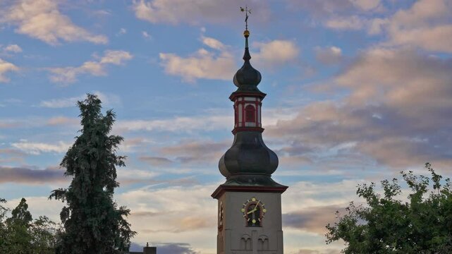 Onion dome on a European church steeple on a sunrise Easter service with tracking movement