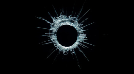 Close-up of a shattered bullet hole in glass, isolated against a white background. High-resolution stock photo capturing intricate cracks and impact details, perfect for security, and destruction