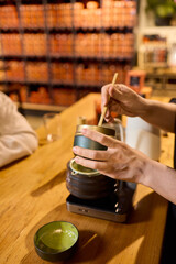 Experience the elegant and refined process of preparing matcha tea with an authentic Japanese bowl