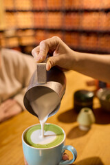 How to Prepare a Creamy Artisan Matcha Latte with Milk Frothing for Your Enjoyment