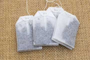Close-up of tea bags on a burlap background