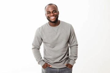 Young man in oversized sweatshirt, isolated on gray background