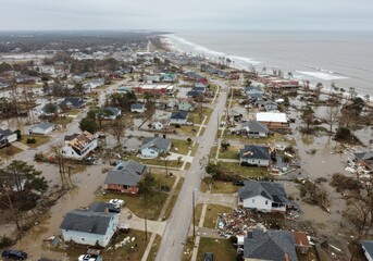 Aerial view of flooded coastal town after major storm damage