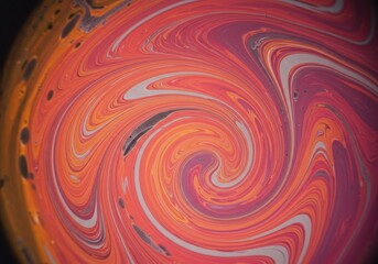 Vibrant swirling abstract art in red and orange hues with dynamic patterns