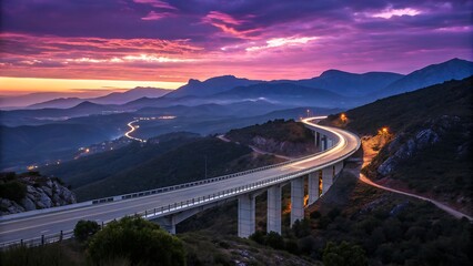 Obraz premium Modern highway winding through mountains dynamic curves vibrant sunset sky engineering meets nature