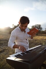Piano Tuning Tool Used By Man Close Up