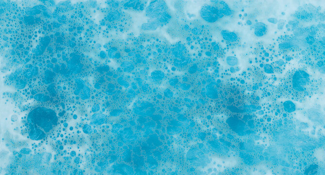 A close-up top view of a blue water texture with small sparkles and bubbles, creating a refreshing and dynamic background. The subtle details add depth, giving the design a lively, aquatic feel