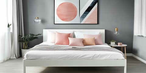 A modern bedroom with bed pillows and aesthetic decor is shown