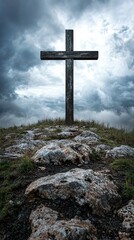 cross on hill with dramatic sky