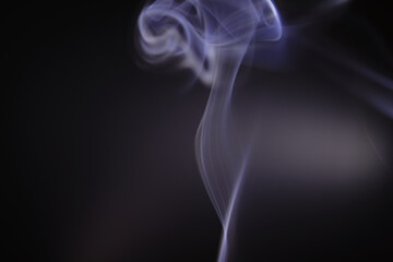 Fototapeta premium Close up of purple gases or smoke in the air