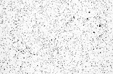 Obraz premium A black and white grainy textured background with a white noise effect, creating a static and gritty appearance. The rough texture adds depth and interest, making it suitable for various design applic