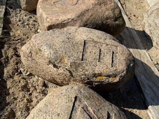 Weathered Rock with Carved Markings