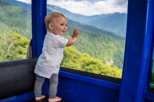 Happy Baby in Cable Car