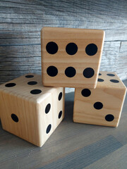 dice on a wooden table