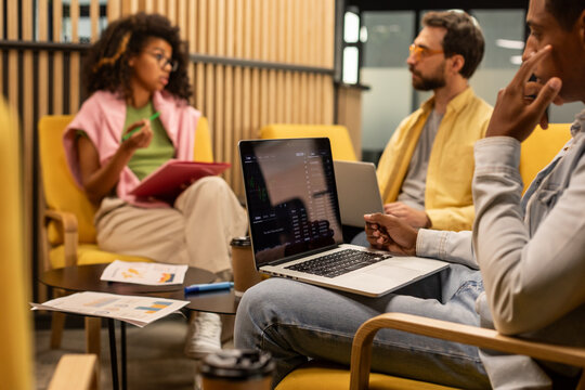 Group of three people in office - Powered by Adobe