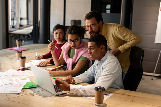 Group of people works with project in office