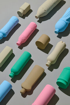 Colorful Plastic Bottles Arranged in a Neat Row